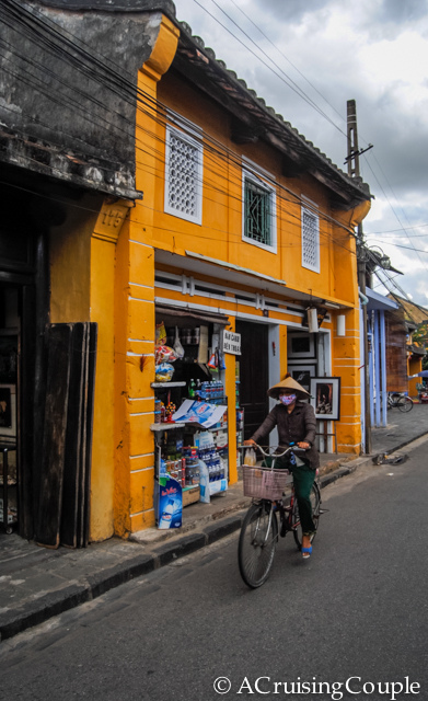 Hoi An Conical Hat Woman on Bicycle