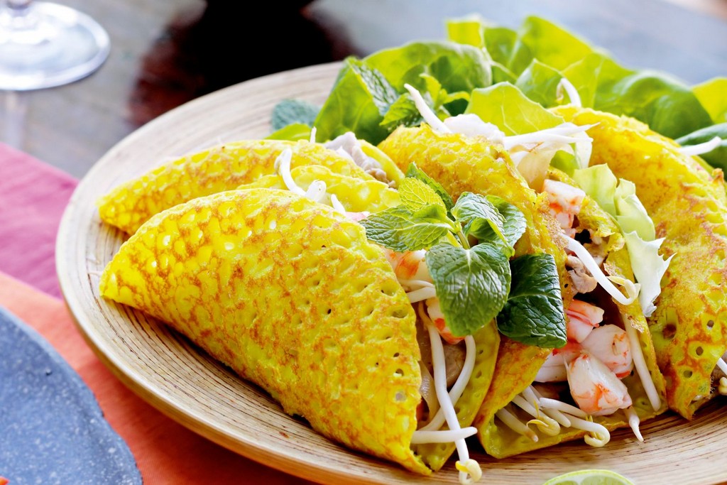 Crispy savory crepes hoi an foods guides 11