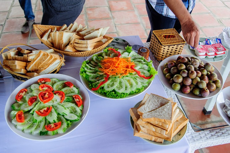 Enjoying fooods in Moc Chau Arena Village