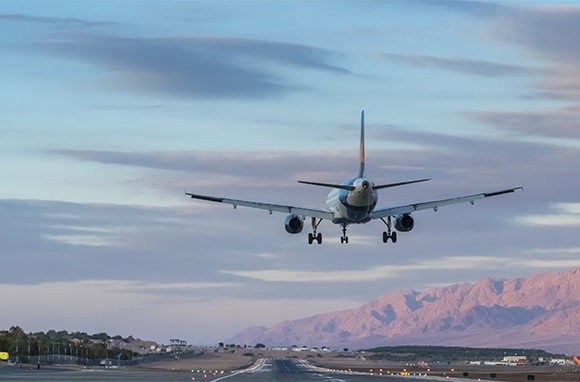 Flying to an airport far away from the city