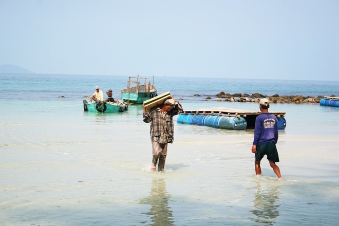Mau locals transporting goods