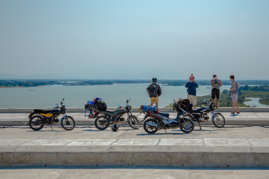 acrossing this brige into hoi an motorbike vietnam