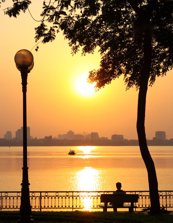 sunset at ho tay west lake hanoi yr