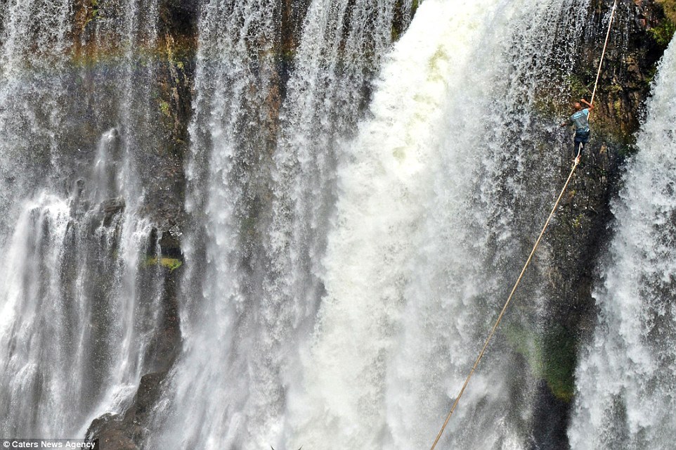 The 34-year-old, who took up highlining two years ago, described the experience as magic and said he felt "very close to nature". Image by Caters News Agency