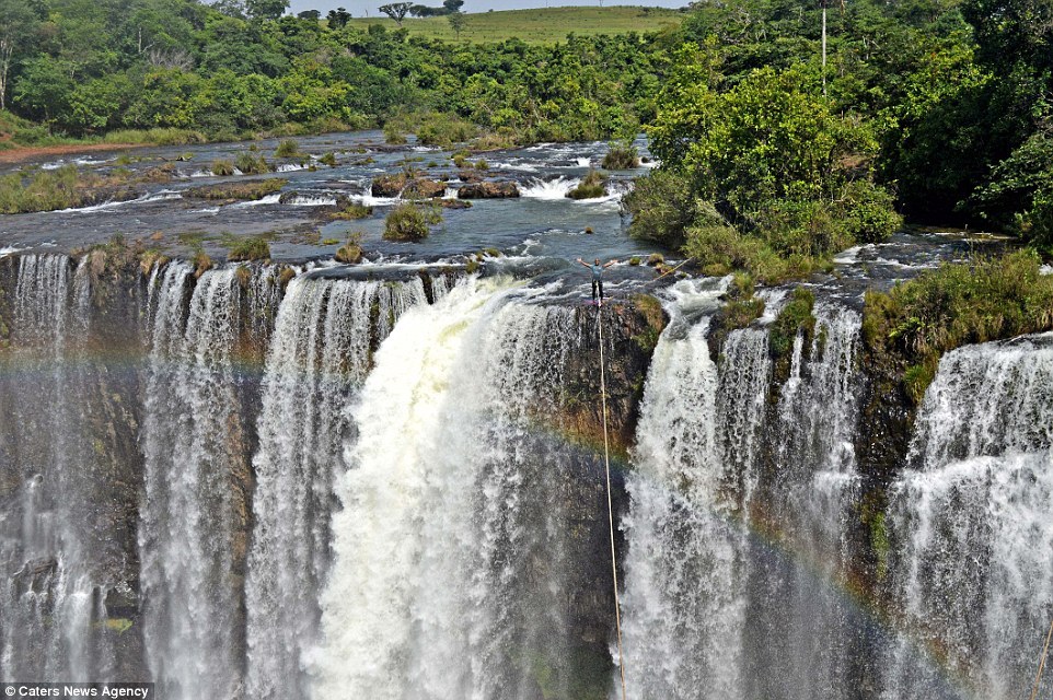 Reginaldo said: "Highlining in the smoke waterfall is very special - you feel very involved by nature". Image by Caters News Agency