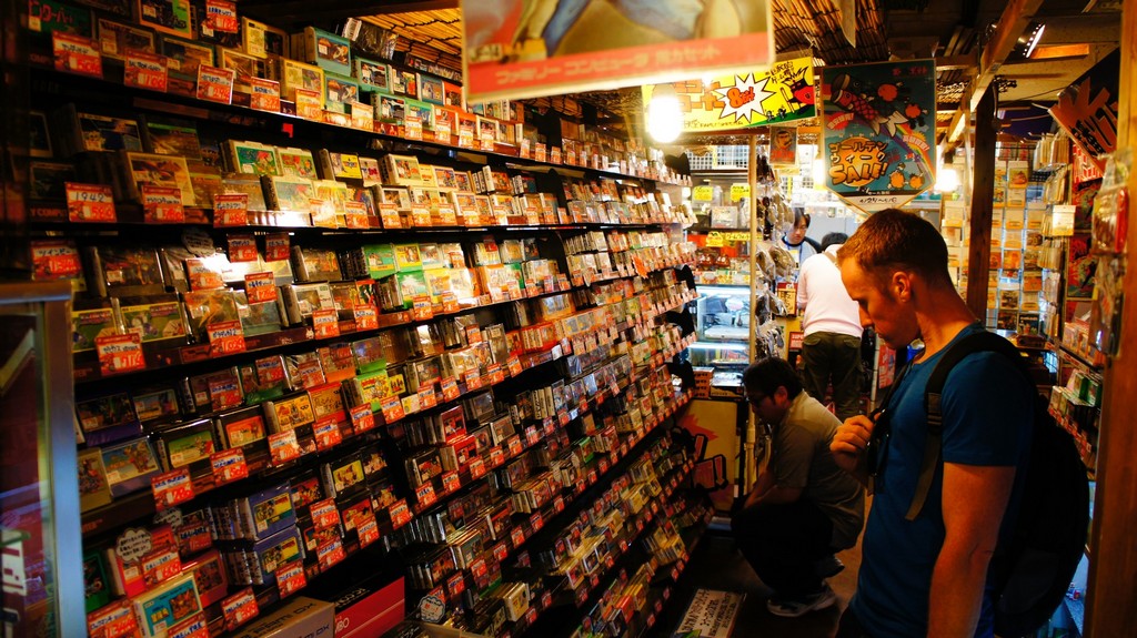 A tourists is choosing his favourite product. Here they are allowed to bargain for a better deal Photo: consoletrader