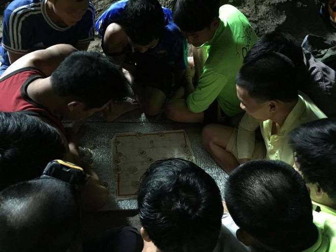 porters play chess in son doong cave