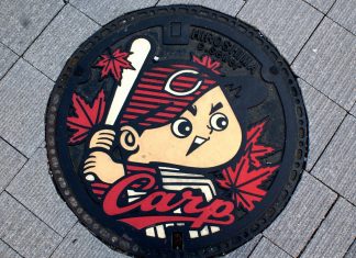 Japanese-manhole-cover-art by S.Morita photographer