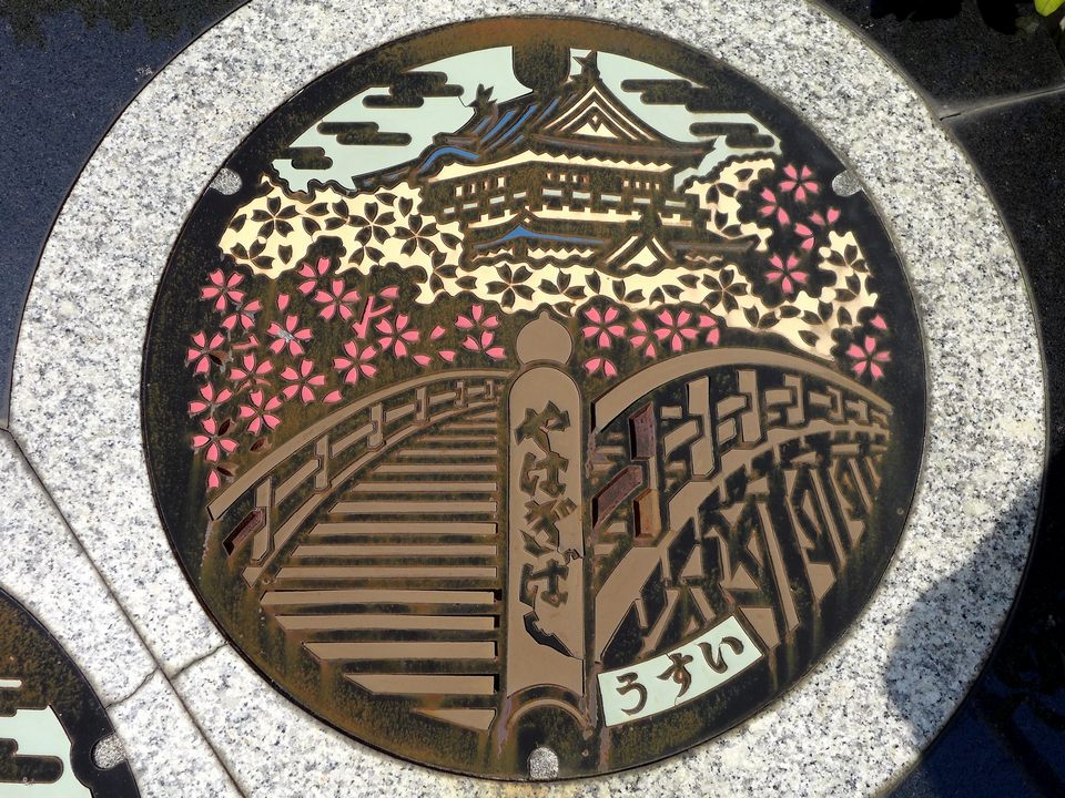 Japanese-manhole-cover-art by S.Morita photographer