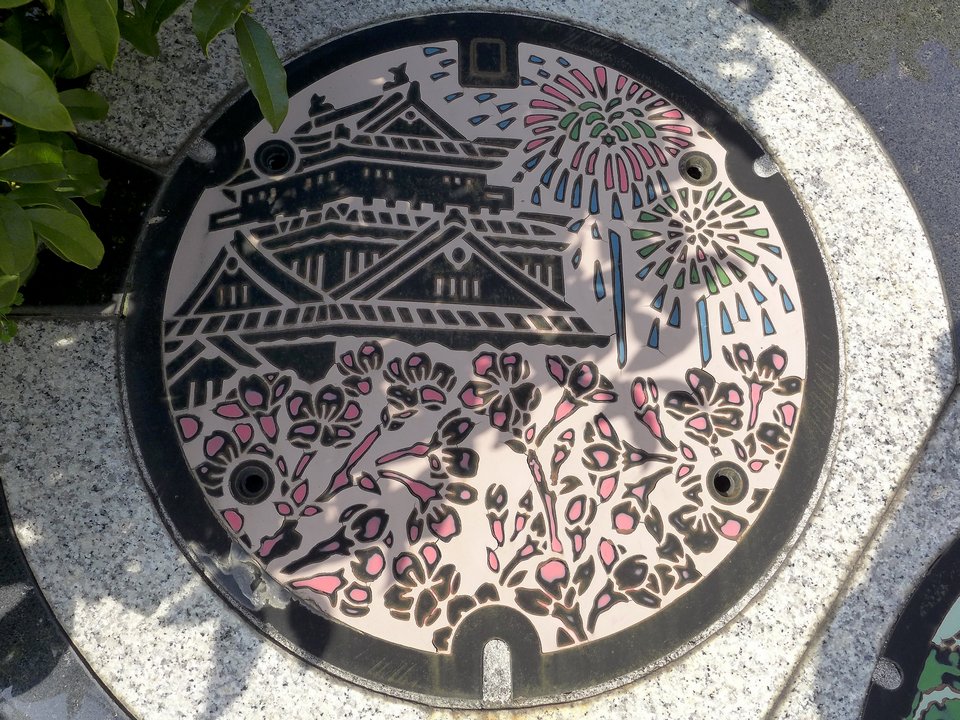 Japanese-manhole-cover-art by S.Morita photographer