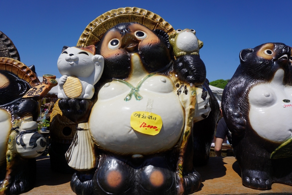 baked ratel-statue-lucky-symbol in japan