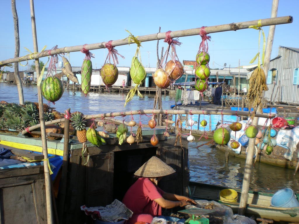 cai be floating market tien giang province