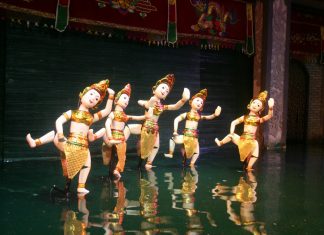 watching water puppet show vietnam travel