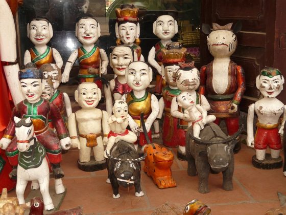 watching water puppet show vietnam travel