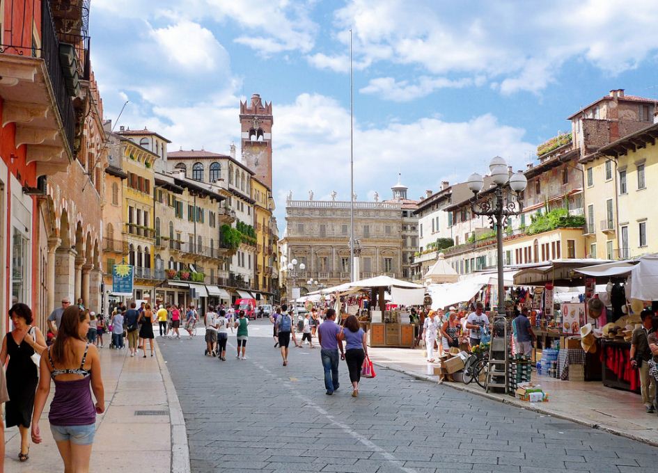 Piazza delle Erbe in Verona buzzes with life
