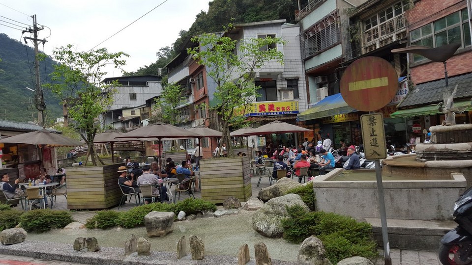 Main town square along the river. Pass this on your right if you're going hiking.