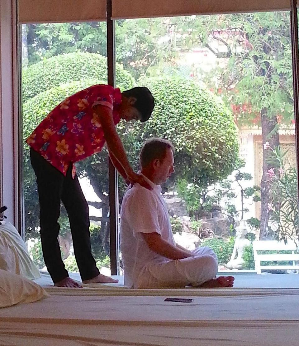 Old inscriptions carved in stone show the bodies pressure points used in traditional Thai massage at3
