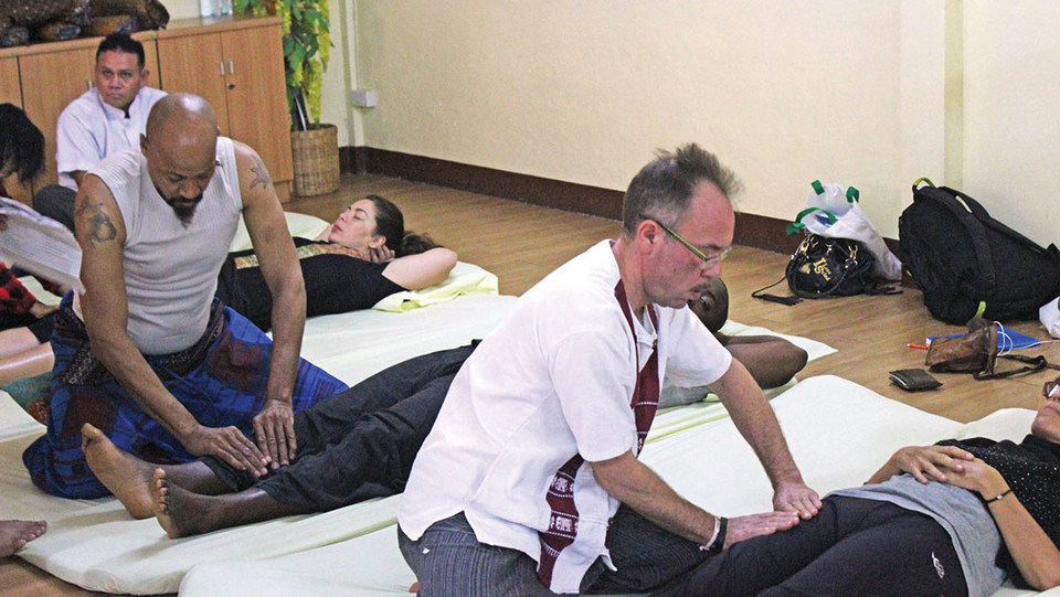 Students at the Wat Po Thai Traditional Massage School in Bangkok