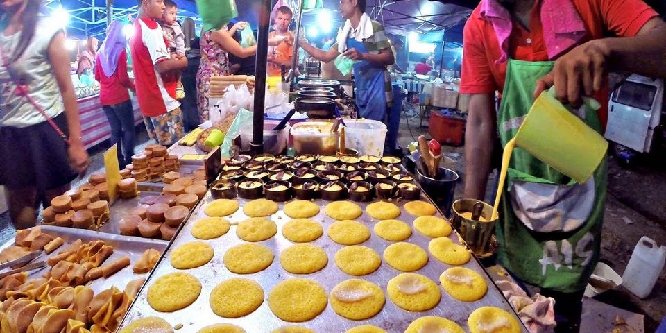 Delicious street food on night market stall Kuala Lumpur Malaysia royalty-free stock photo
