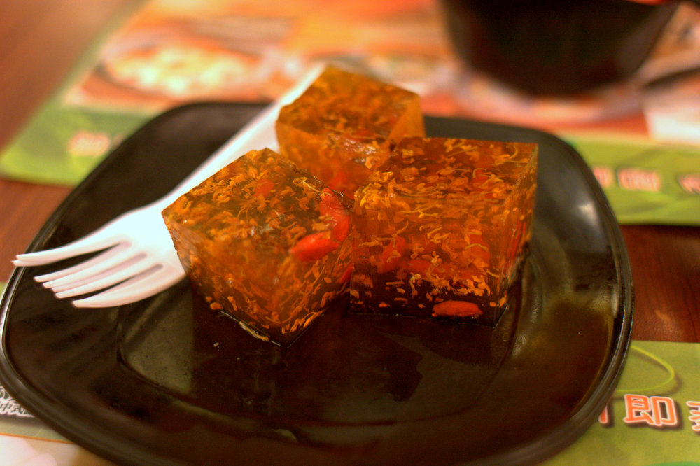 Tim Ho Wan signature dessert: Tonic petal and medlar cake.