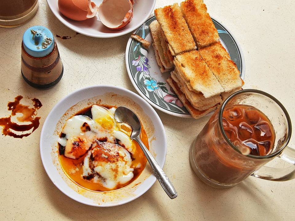 Kaya is a special cream served with toast and soft-boiled eggs, sip with a little of coffee is a standard meal.