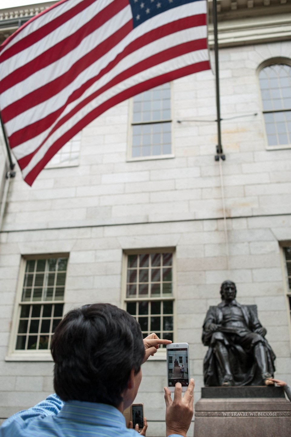 John Harvard statue on Harvard campus.