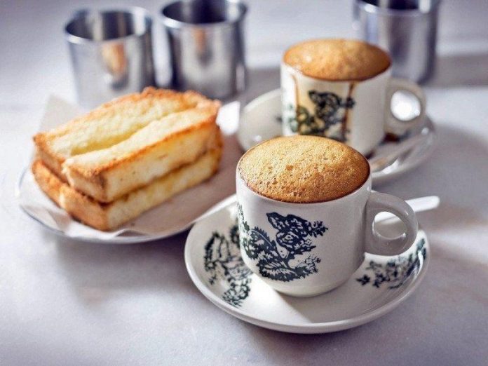 Typical Ipoh breakfast with white coffee and toasts Typical Ipoh breakfast with white coffee and toasts