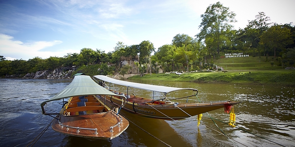 long tail boats on kwai river