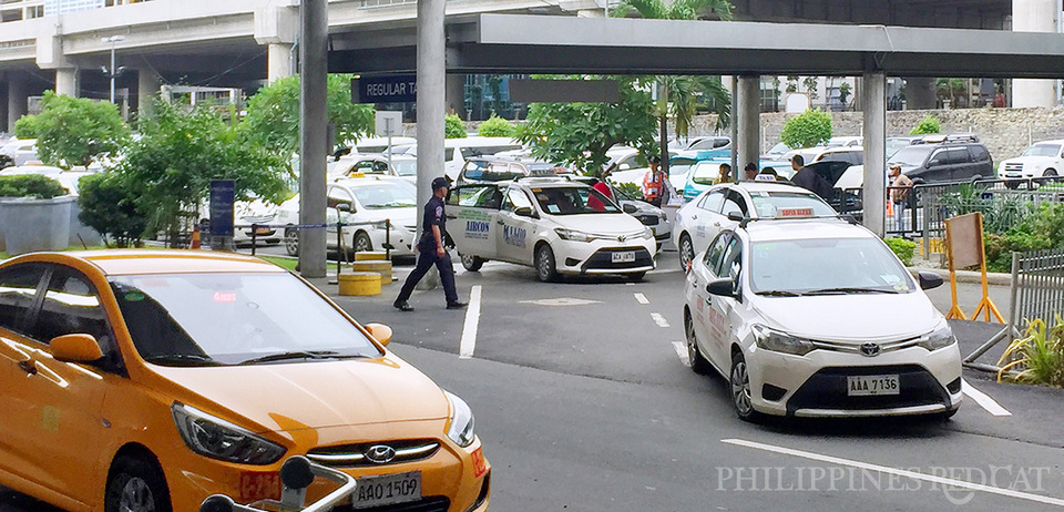 Manila Airport Taxis White and Yellow