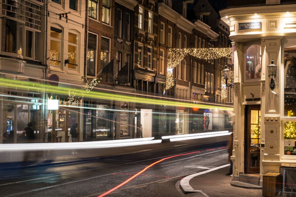 Amsterdam public transit at night.