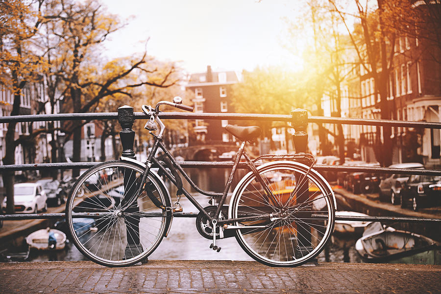 Bicycles Parked On A Bridge In Amsterdam Photograph by Serts,amsterdam blog,amsterdam travel blog,amsterdam travel guide blog,amsterdam city guide