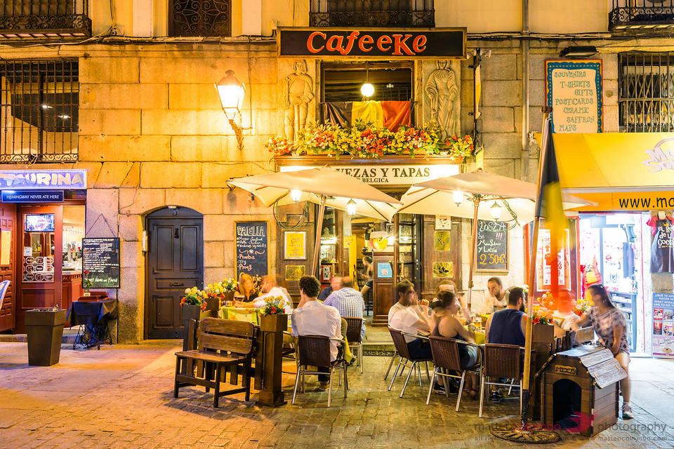 Tourists dining outdoor at tapas bar, Madrid, Spain