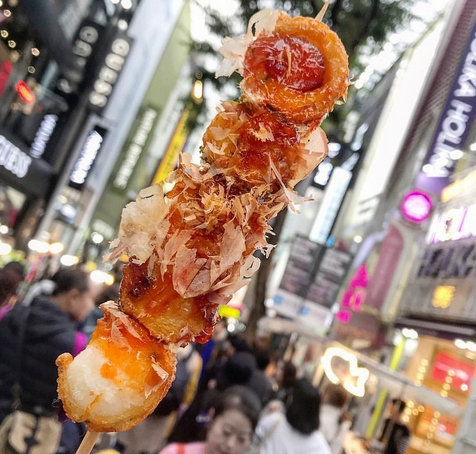 Fish cake wrapped in deep fried sausage