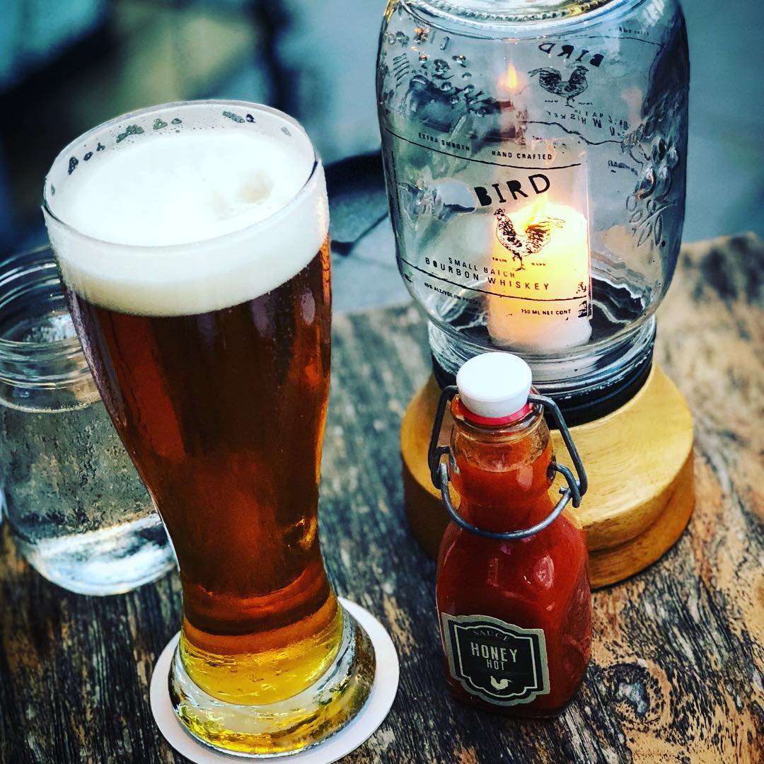 Enjoy a beer and watch the street at The Bird bar.
