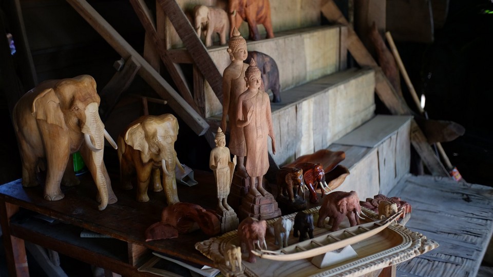 wood carvings laos