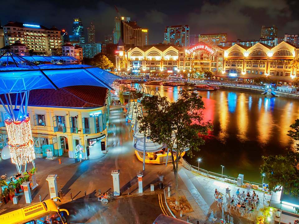 A view of a colourful Clarke Quay gets buzzing as night falls in Singapore