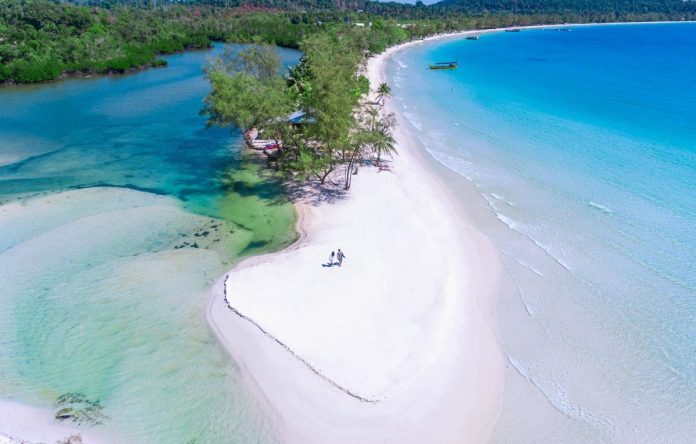 beach-trees-boats-people-koh-rong-cambodia-1200x765