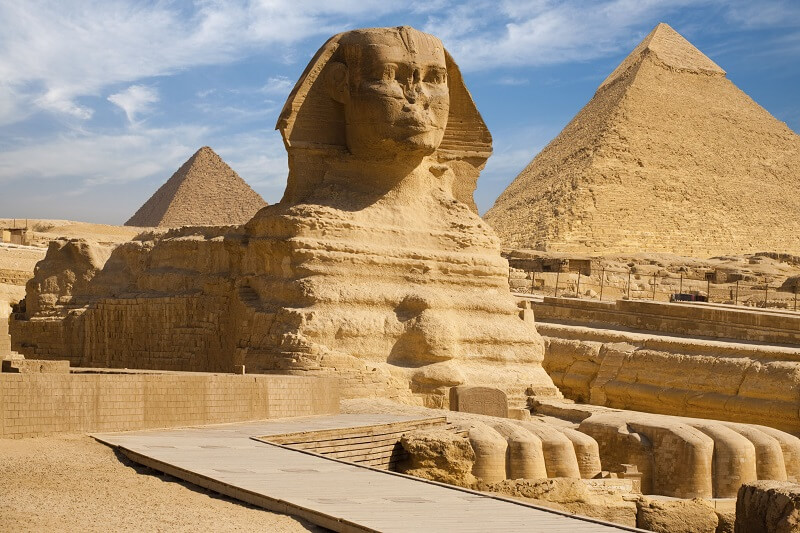 In front of the pyramid is the Sphinx, carved from a single block of stone.